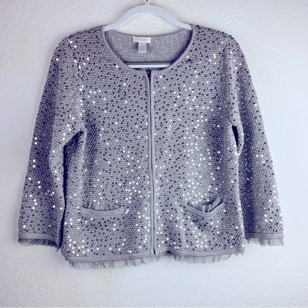 CHICO’S Silver with silver sequins zip cardigan. Tulle gathers at hem, pockets,
